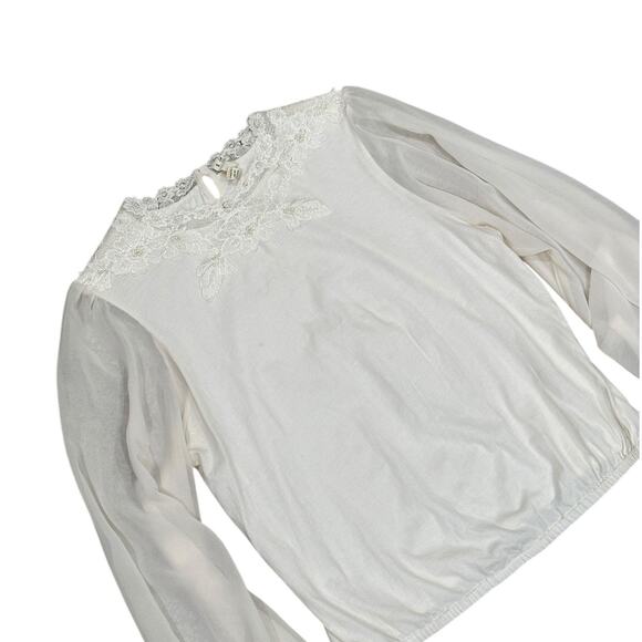 Anthropologie Tiny Long-Sleeve
Mock-Neck Lace Embellished Top - Picture 2 of 9